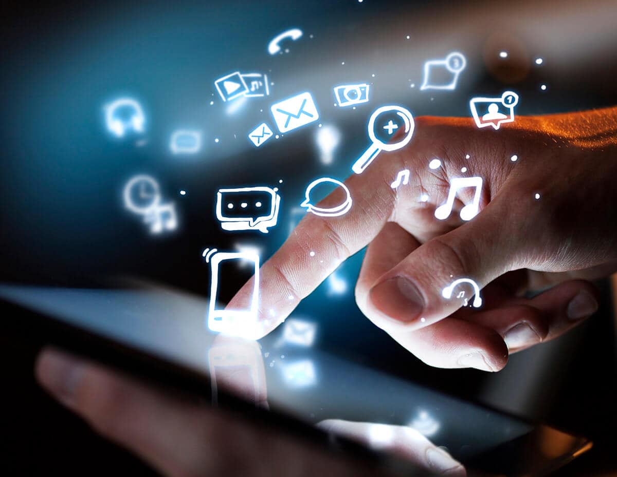 Digital marketing icons floating around touchscreen hand, SEO, social media, and online advertising concepts.
