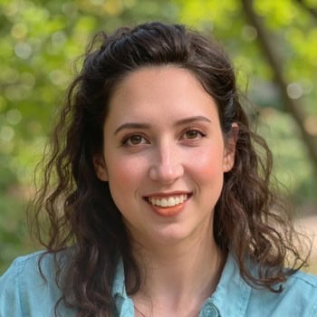 High-performing woman smiling outdoors, promoting digital marketing and SEO services.